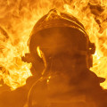 fireman-standing-near-fire-on-building-3448641.jpg